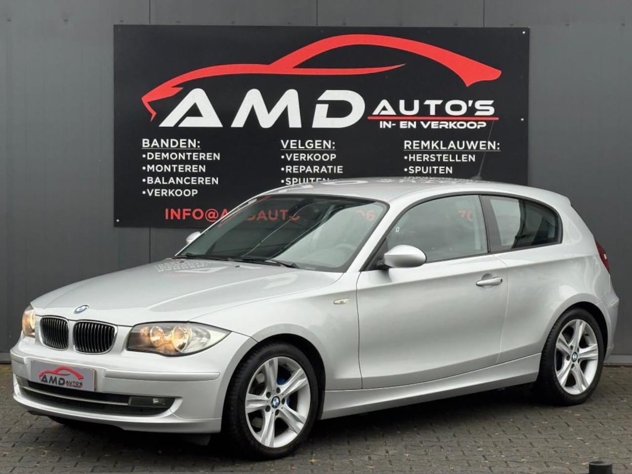 BMW 1-serie - 118i Business Line |Nap|Airco|Elec Ramen|Boekjes|Bekerhouder| - AutoWereld.nl
