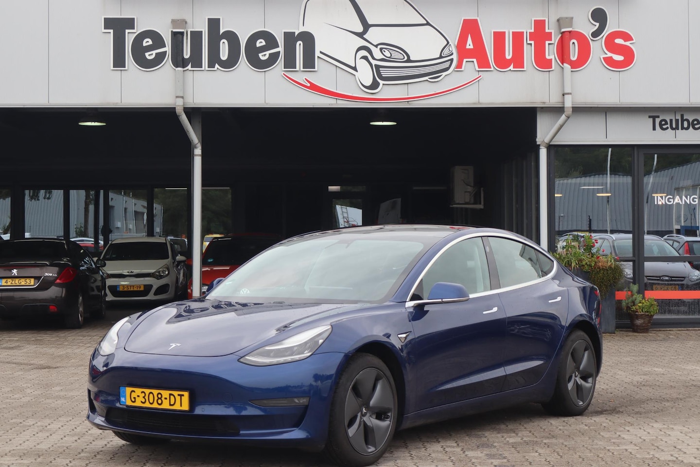 Tesla Model 3 - Long Range RWD Long Range AWD 75 kWh Autopilot, Trekhaak, Lederen interieur, 360 Camera - AutoWereld.nl