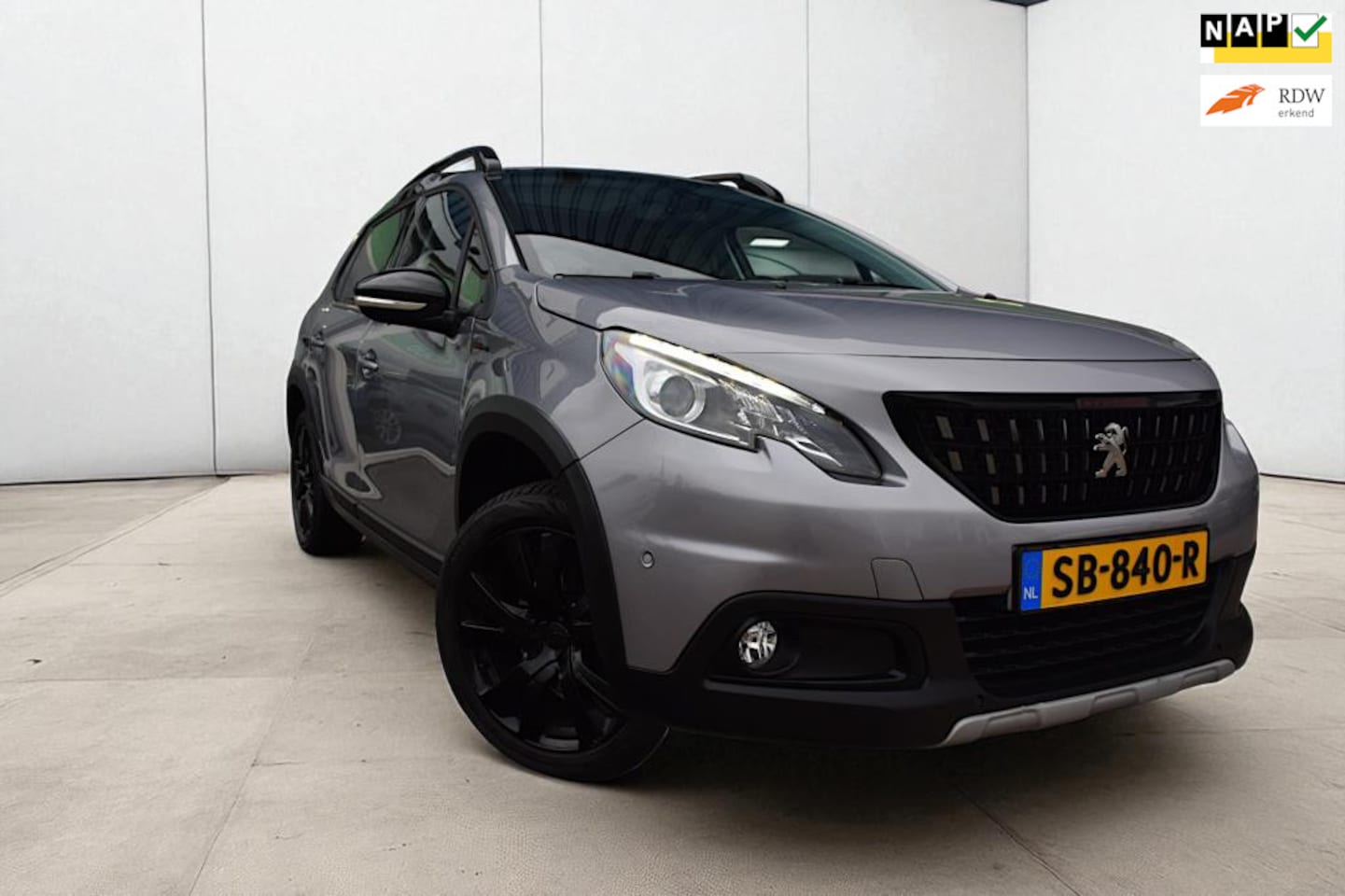 Peugeot 2008 - 1.2 PureTech GT-Line 1.2 PureTech GT-line, Parkeercamera, Afneembare trekhaak, Half leder,Climate control, NAP, - AutoWereld.nl
