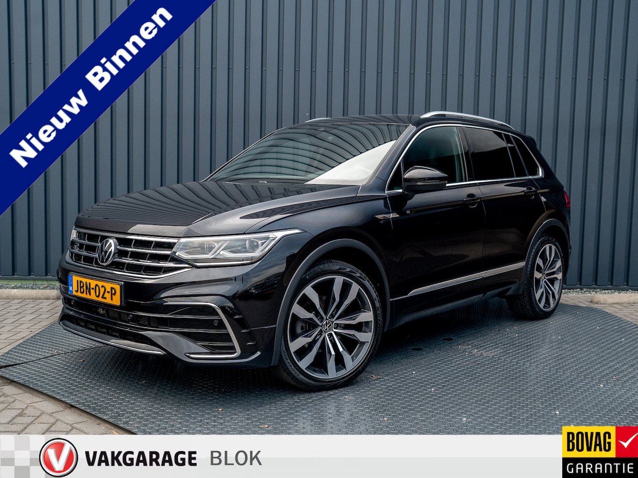 Volkswagen Tiguan - 1.5 TSI R-Line Business+ | Leder | Stoelgeheugen | IQ Light | Elk. A-klep | Prijs Rijklaar - AutoWereld.nl
