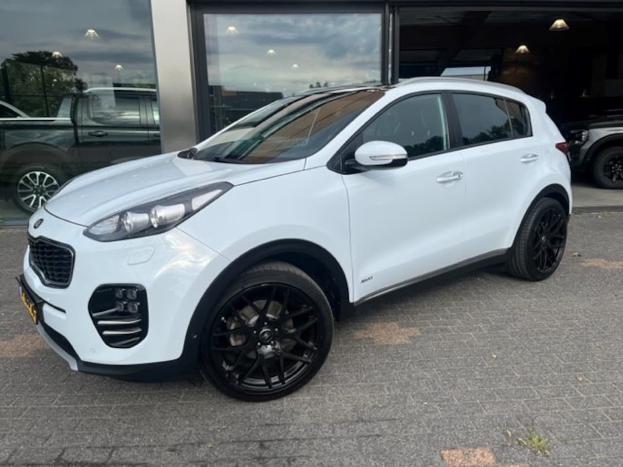Kia Sportage - 1.6 T-GDI 4WD AUT GT-Line PlusLine LEDER/NAVI/CLIMA 6MND GAR € 17.990 Auto in zeer goede s - AutoWereld.nl