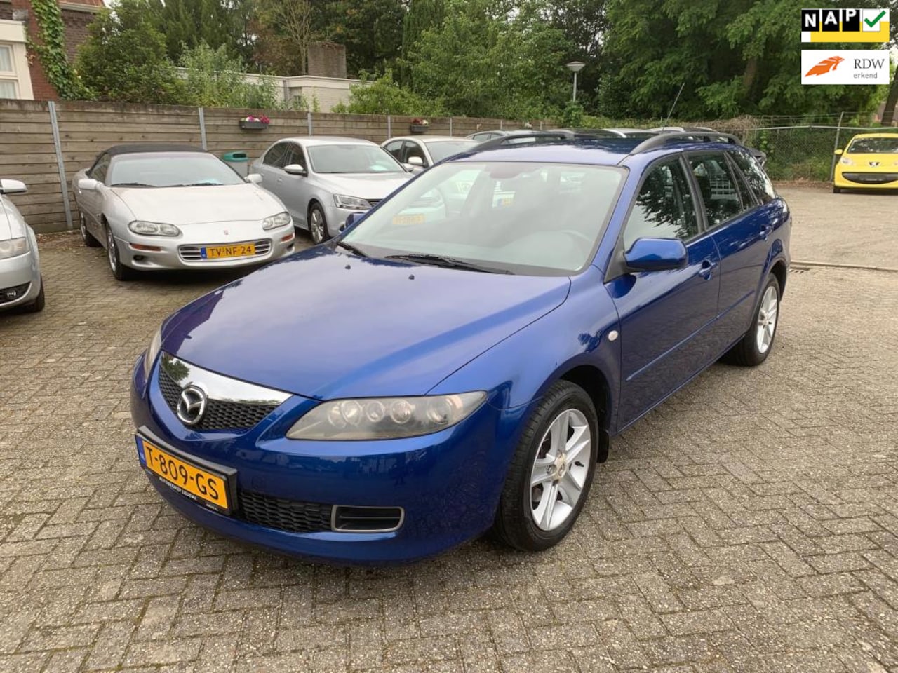 Mazda 6 Sportbreak - 1.8i Exclusive //APK 20-6-2026 // Airco - AutoWereld.nl