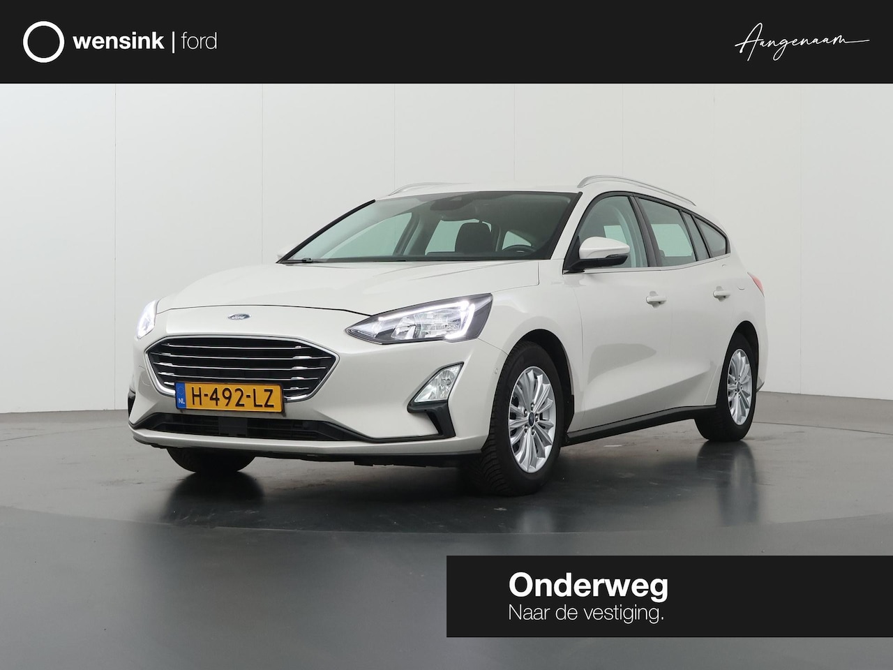 Ford Focus Wagon - 1.0 EcoBoost Titanium Business | Winterpakket | Parkeercamera | Navigatie | Cruise Control - AutoWereld.nl