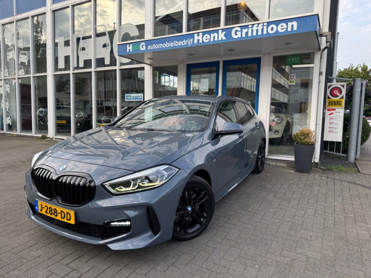 BMW 1-serie - 118i High Executive I M-sport pakket I Apple Carplay I HUD I Leer - AutoWereld.nl
