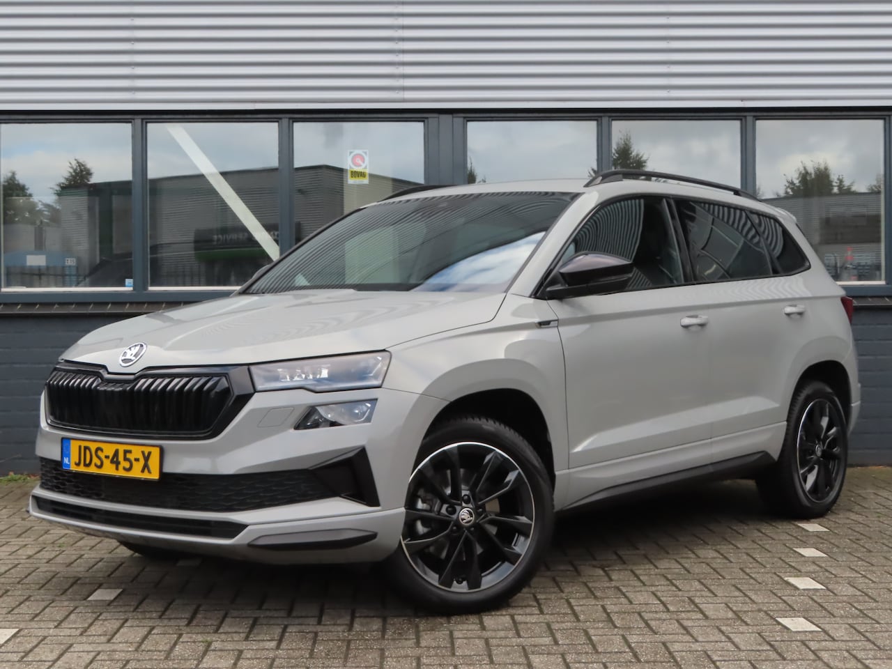 Skoda Karoq - 1.5 TSI ACT Sportline Business | trekhaak wegklapbaar | verwarmbaar stuurwiel | - AutoWereld.nl