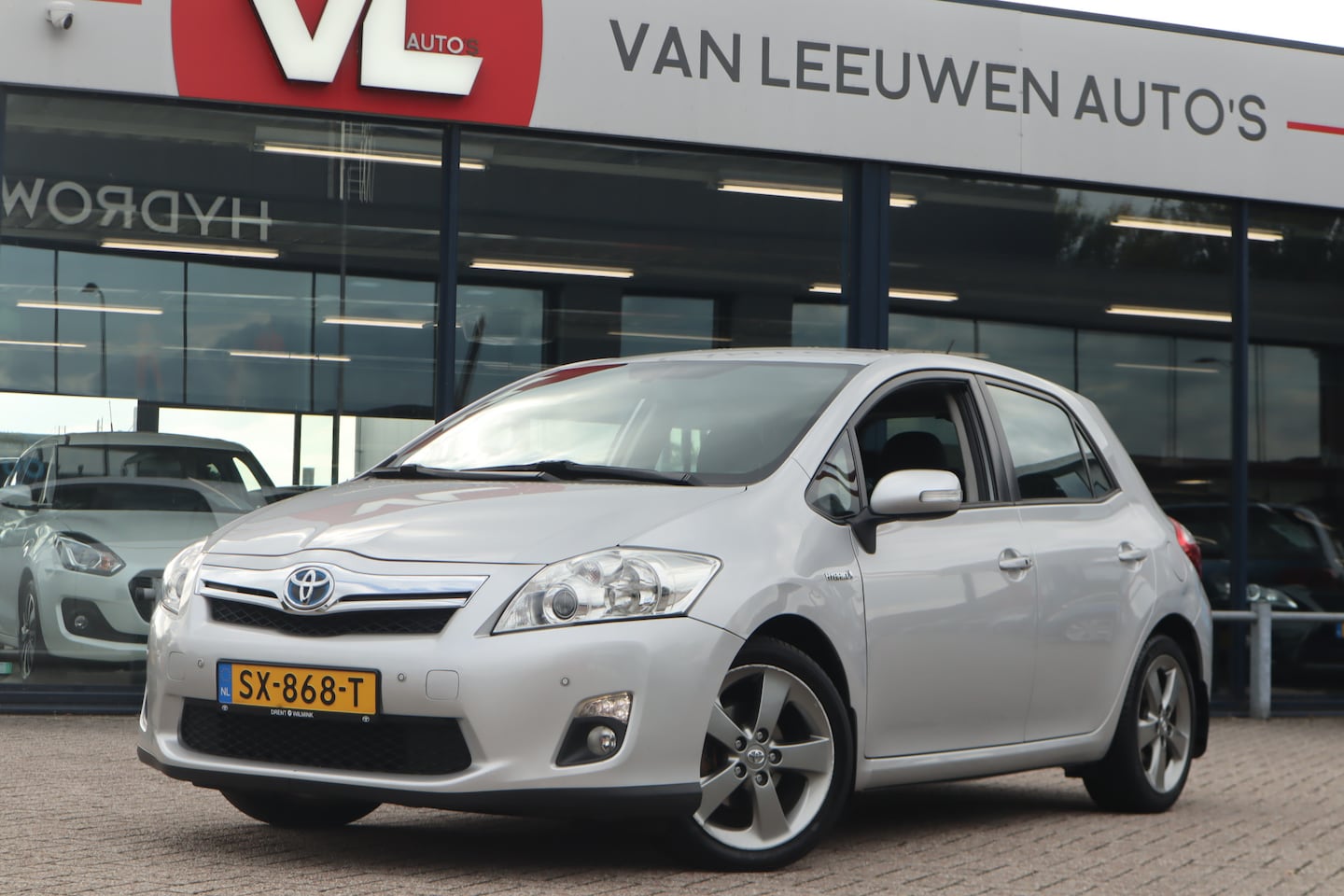 Toyota Auris - 1.8 Full Hybrid Dynamic Business | Automaat | Navi | Camera - AutoWereld.nl
