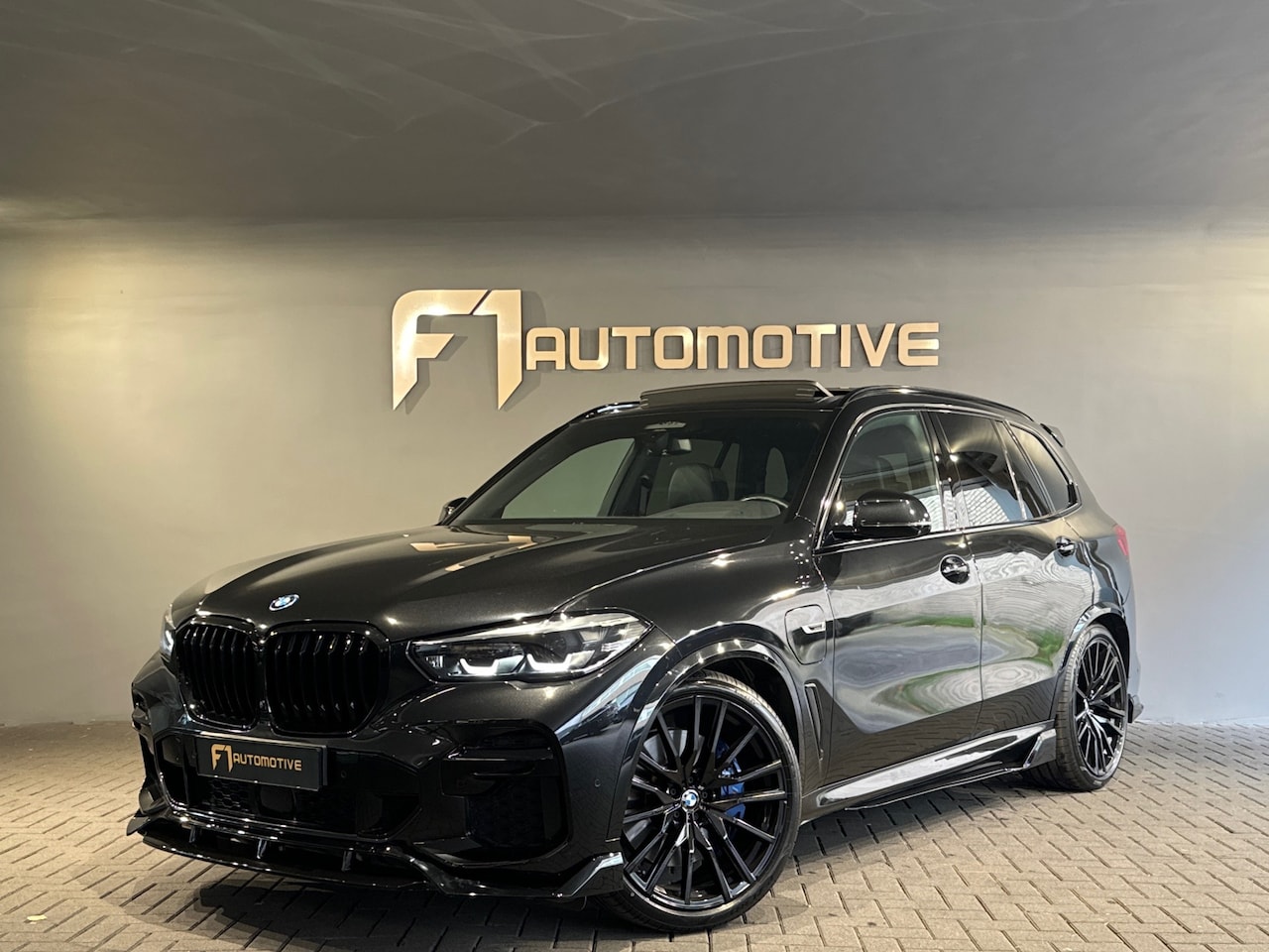 BMW X5 - XDrive45e High Executive M Sport Pano|HuD|Keyl|Memory - AutoWereld.nl