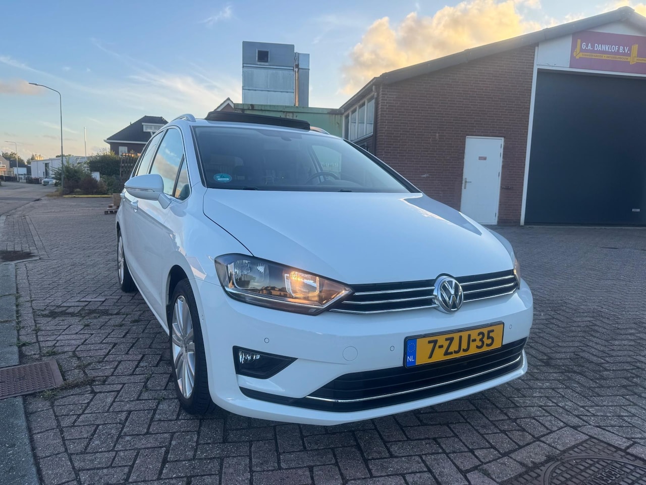 Volkswagen Golf Sportsvan - 1.2 TSI Highline DSG (bj Dec-2014) PANORAMA|AUT|NAVI|PDC - AutoWereld.nl