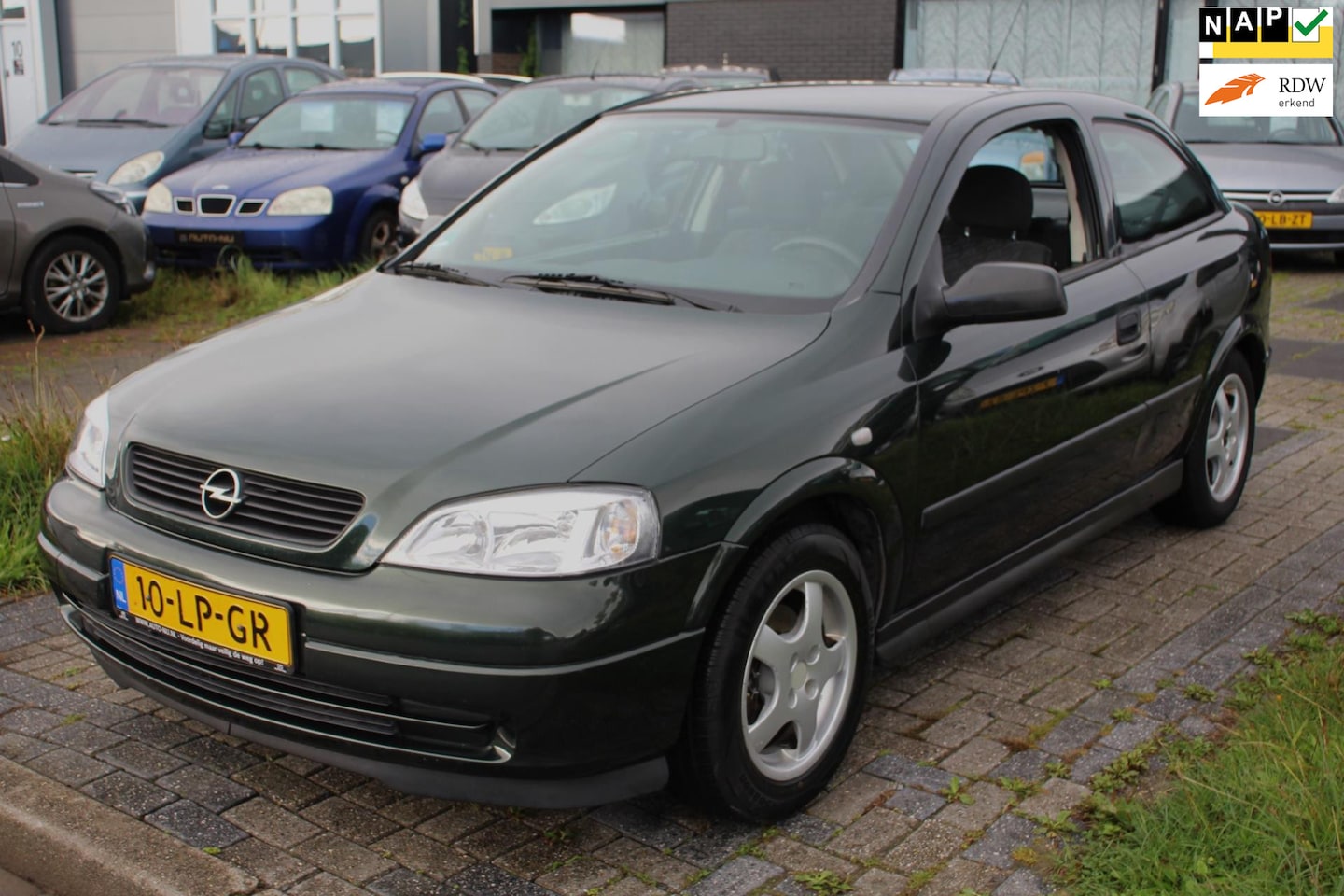 Opel Astra Coupé - 1.6 Njoy LM-Velgen Alle rekeningen en boekjes NAP APK - AutoWereld.nl