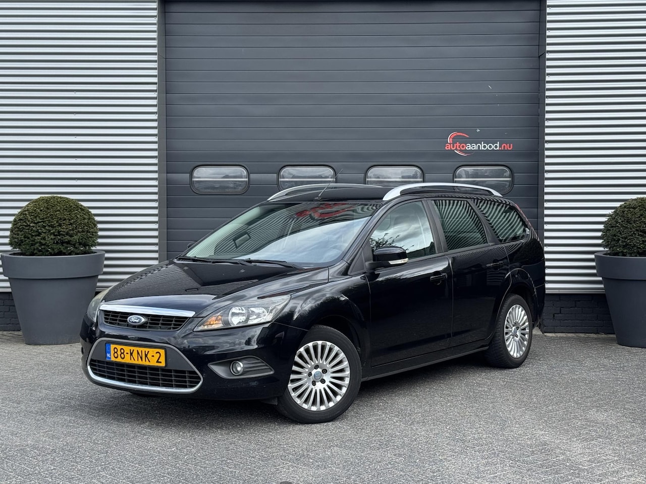 Ford Focus Wagon - 1.8 Limited Flexi Fuel | Airco | Lichtmetalen Velgen | Parkeersensoren | Trekhaak | - AutoWereld.nl