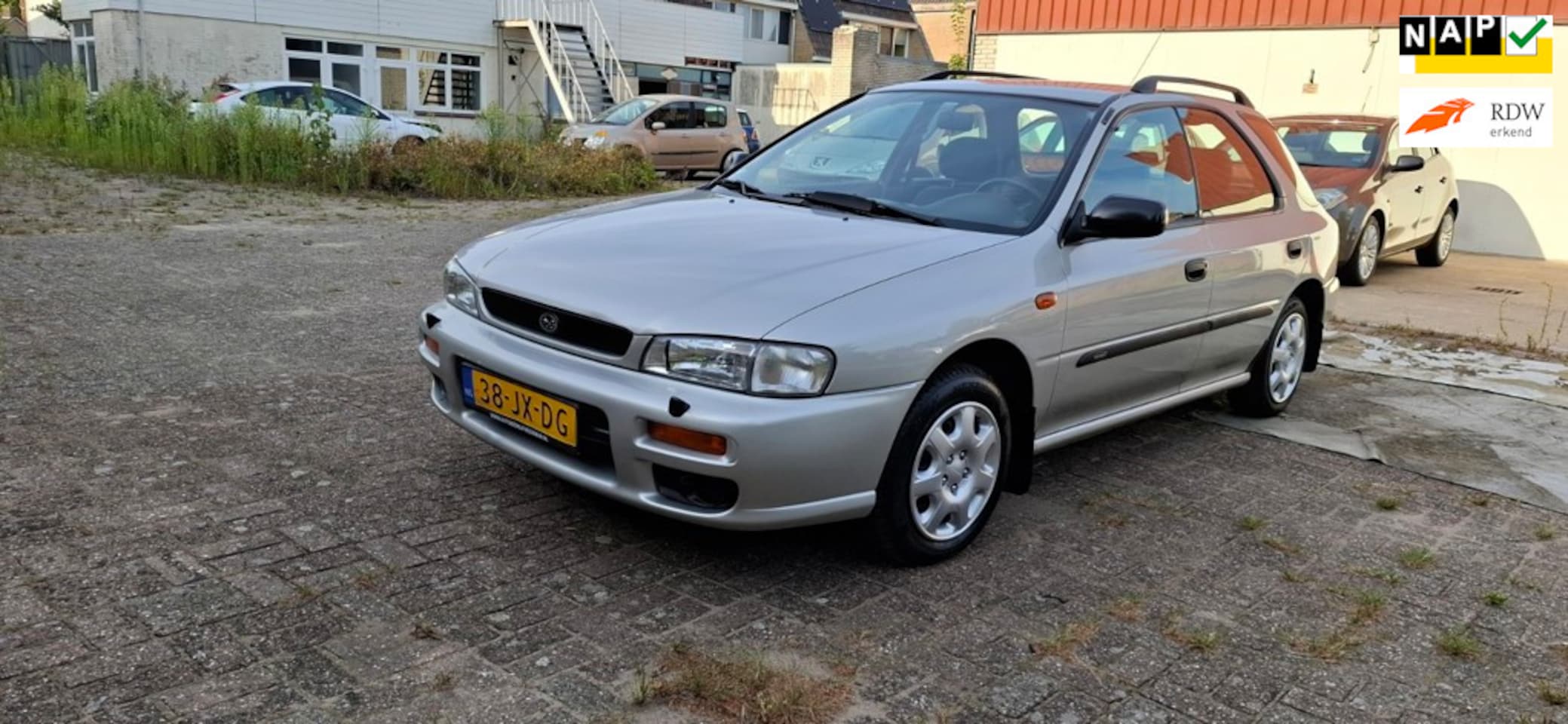 Subaru Impreza Plus - 2.0 GL AWD 2.0 GL AWD - AutoWereld.nl