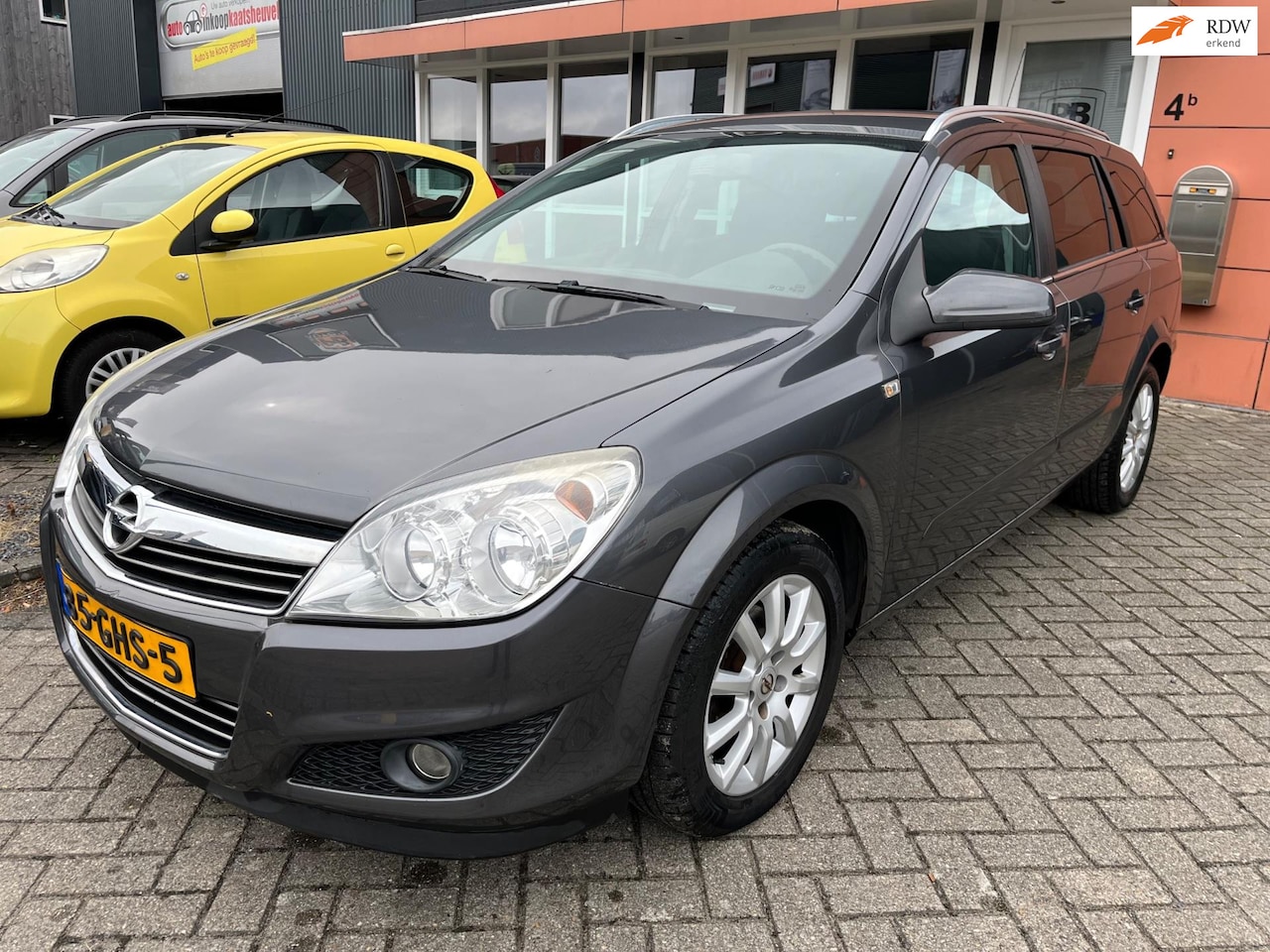 Opel Astra Wagon - 1.6 Temptation 2e eigenaar airco 122 dkm - AutoWereld.nl