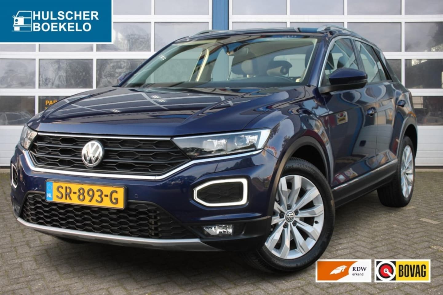 Volkswagen T-Roc - 1.5 TSI Sport  150pk    Stoel/stuur verwarming / afneembare trekhaak **NL-Auto** - AutoWereld.nl