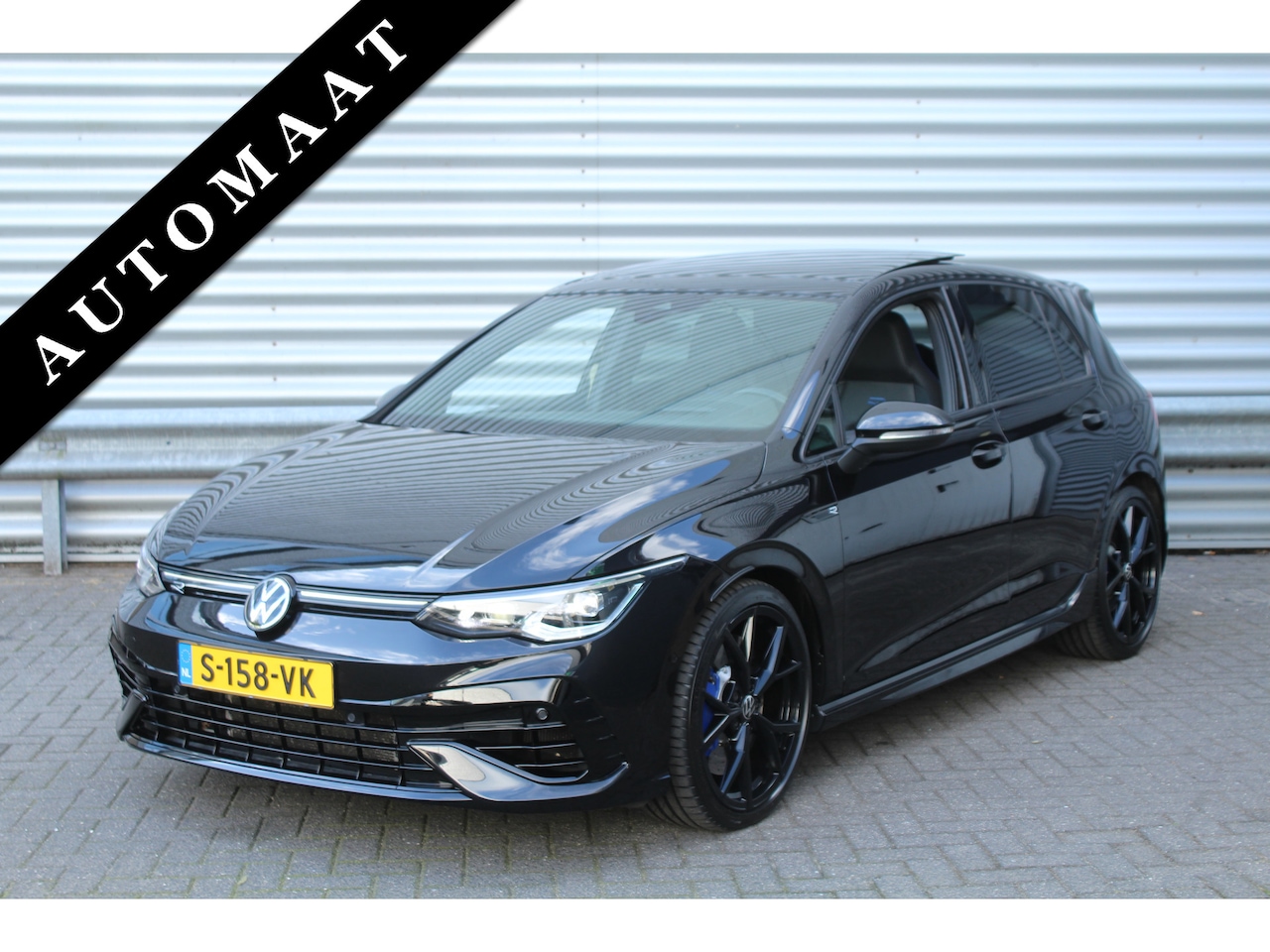 Volkswagen Golf - 2.0 TSI 320pk R 4Motion DSG7 Clima Cruise Navi Camera Panoramadak HUD Akrapovic - AutoWereld.nl
