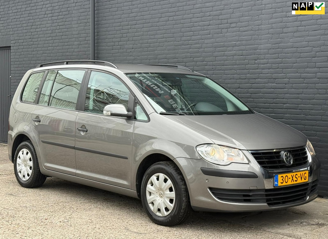 Volkswagen Touran - 1.4 TSI Optive AIRCO | CRUISE | ELEK RAMEN | NWE APK - AutoWereld.nl