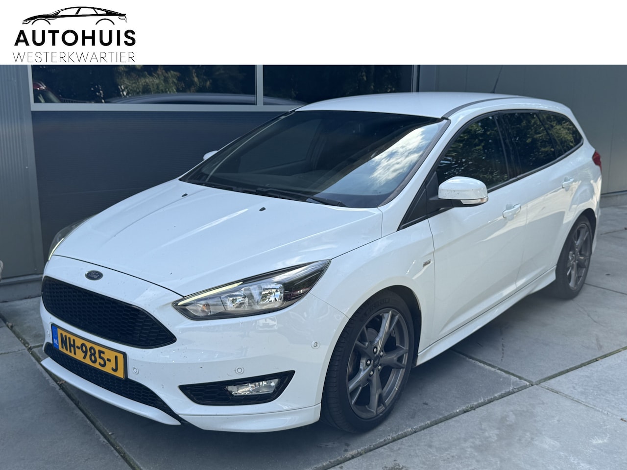 Ford Focus Wagon - 1.0 Ecoboost 125pk H6 ST-Line Navigatie LMV PDC Climate Control - AutoWereld.nl