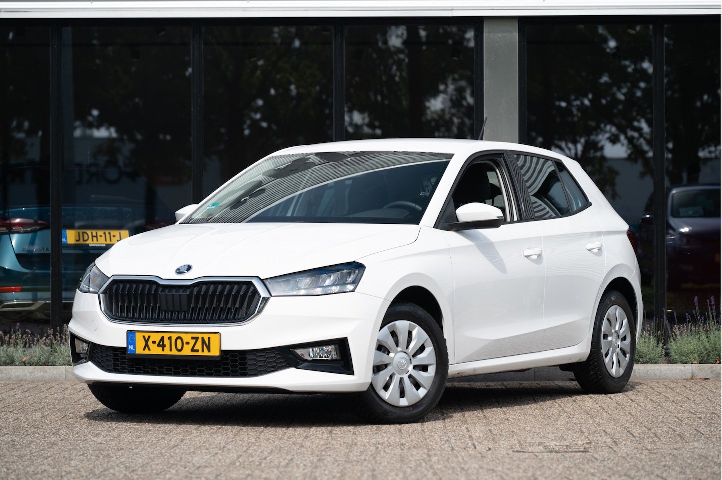Skoda Fabia - 1.0 MPI Ambition | Stoelverwarming | AppConnect | Cruise | PDC - AutoWereld.nl