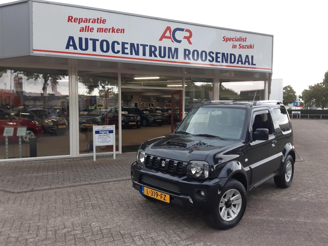 Suzuki Jimny - 1.3 Exclusive LMV LEER TREKHAAK AIRCO zeer nette auto - AutoWereld.nl