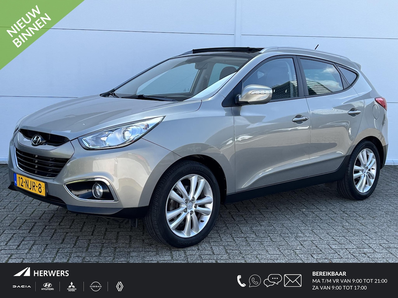 Hyundai ix35 - 2.0i i-Catcher / Dealer onderhouden / Lage KM stand / Automaat / Climate control/ Panorami - AutoWereld.nl