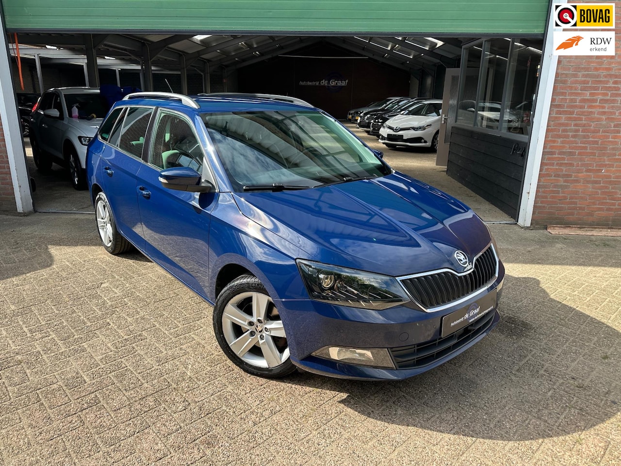 Skoda Fabia Combi - 1.2 TSI DSG|TRHK/CRUISE/NAVI/PDC - AutoWereld.nl