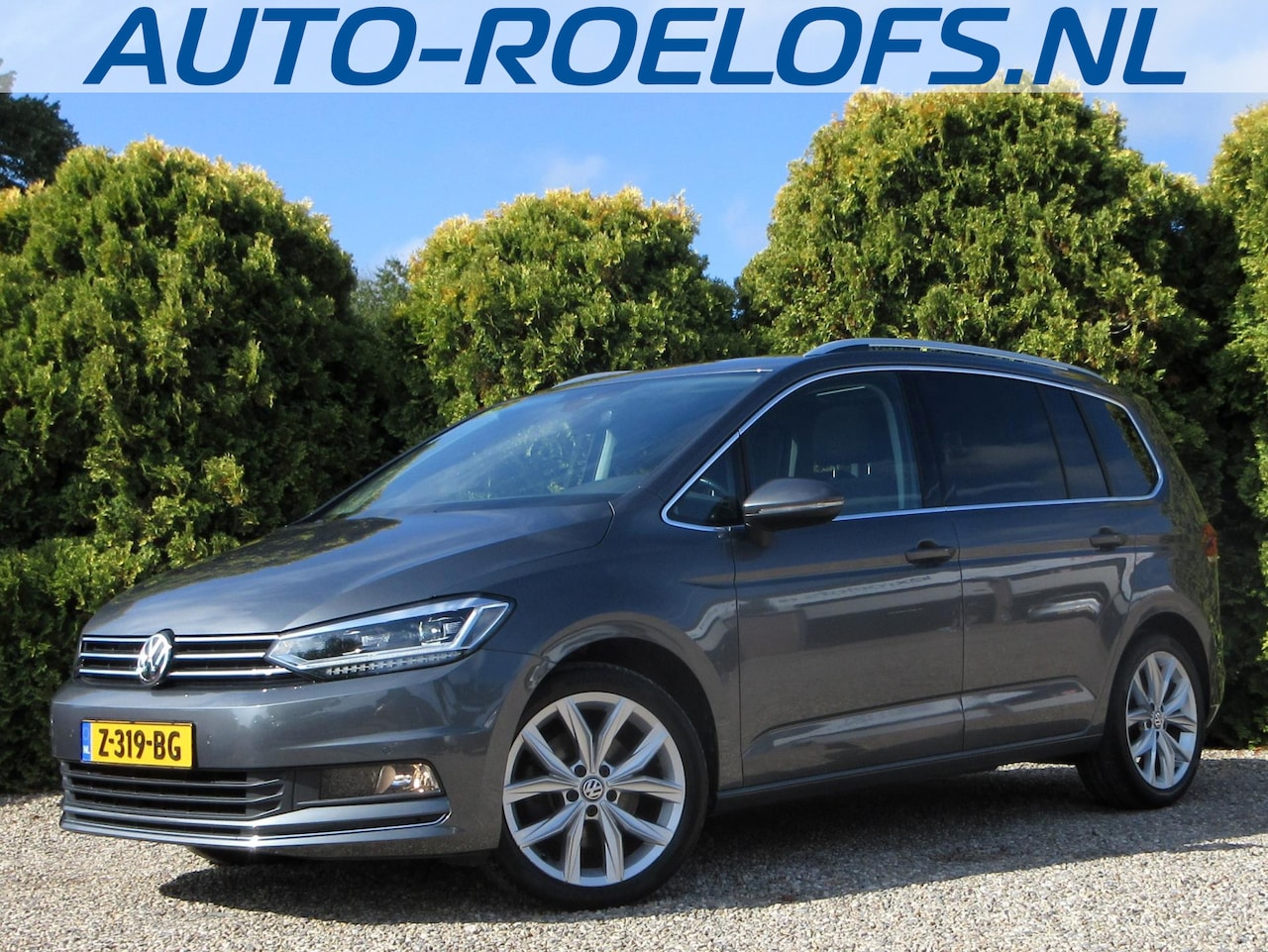 Volkswagen Touran - 1.5 TSI Highline Automaat*Navi*Pano.dak*Trekhaak* - AutoWereld.nl