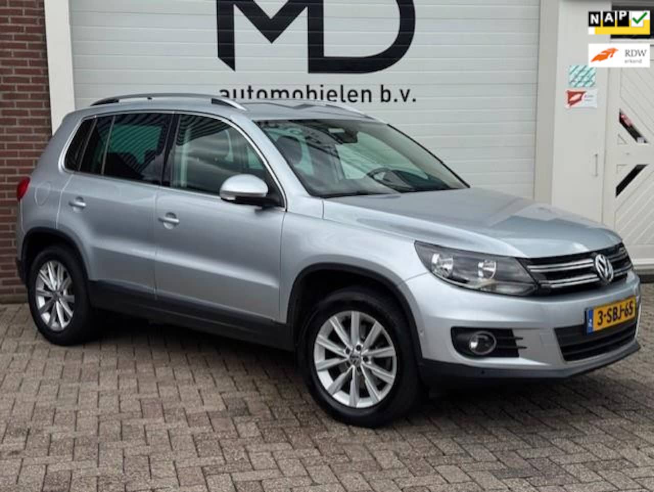 Volkswagen Tiguan - 1.4 TSI Sport&Style - Trekhaak - Navi -PDC - AutoWereld.nl