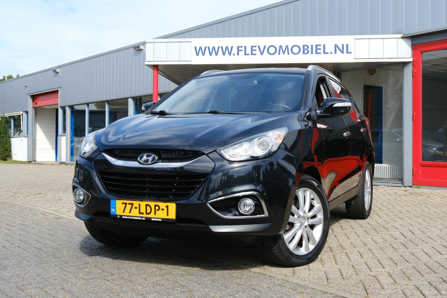 Hyundai ix35 - 2.0i Style Half leder|Clima|Cruise|Trekhaak|LMV - AutoWereld.nl