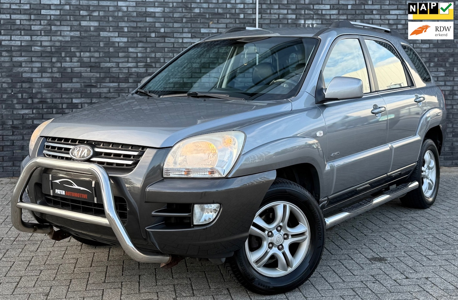 Kia Sportage - 2.0 CVVT Adventure 4WD Cruise Control|Navigatie|Trekhaak|Climate Control|Side-bars|Bull-ba - AutoWereld.nl