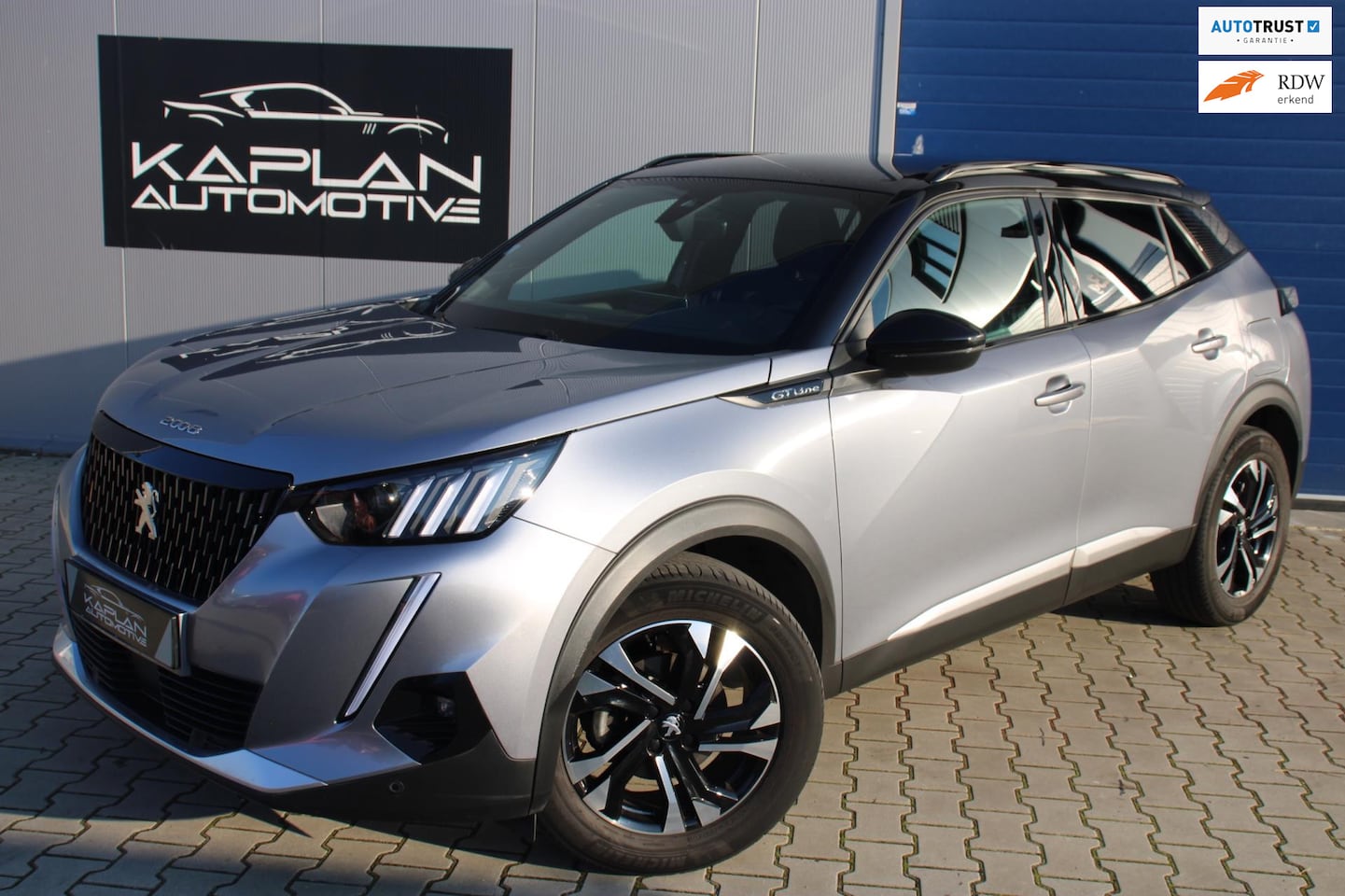 Peugeot 2008 - GT 131PK TREKHAAK NAVI AUT. 360CAM GARANTIE CARPLAY SFEERVERLICHTING - AutoWereld.nl