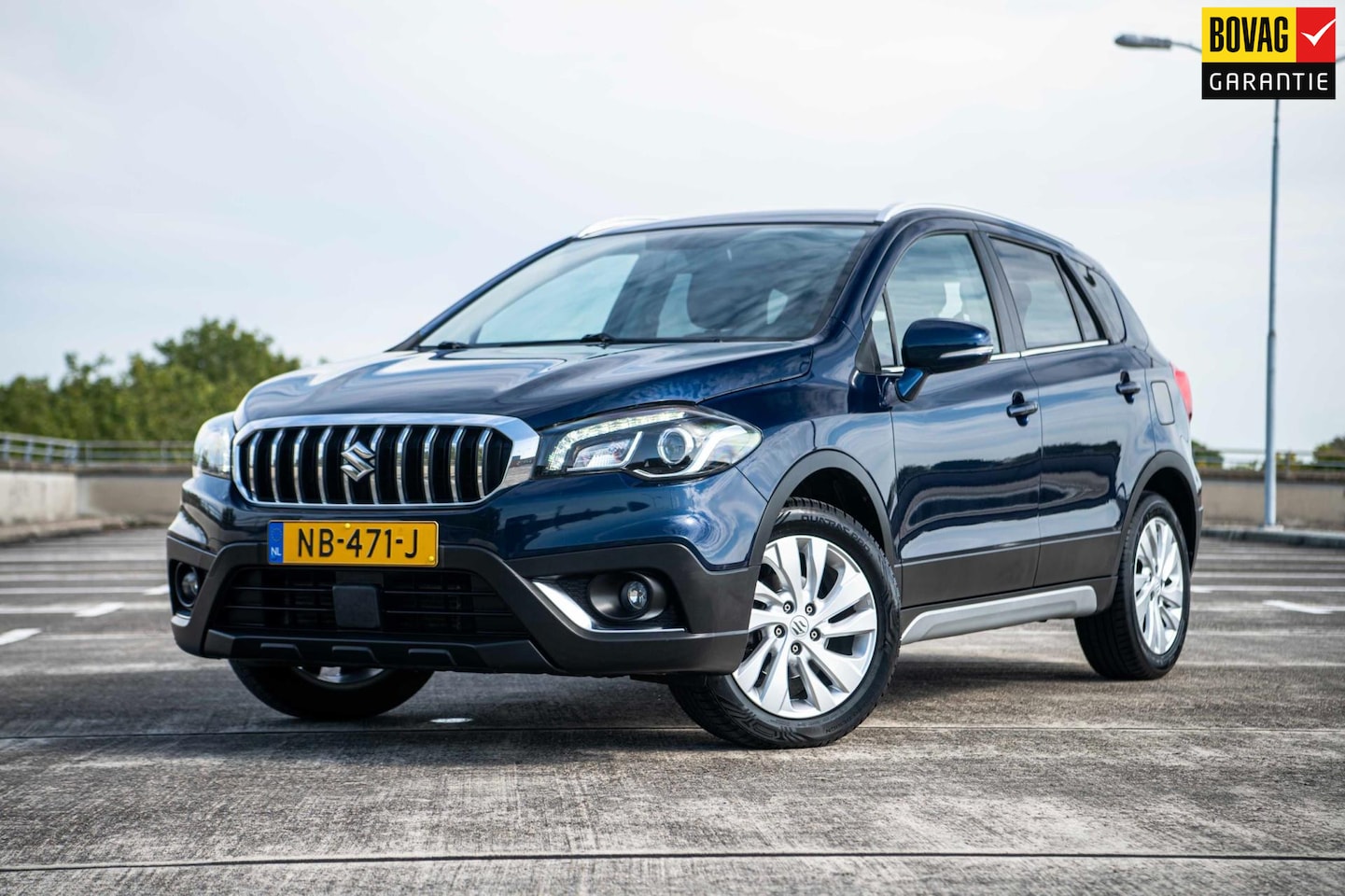 Suzuki S-Cross - 1.0 Boosterjet Exclusive | Airco/Clima | Cruise Control | Camera | Stoelverwarming | LM Ve - AutoWereld.nl
