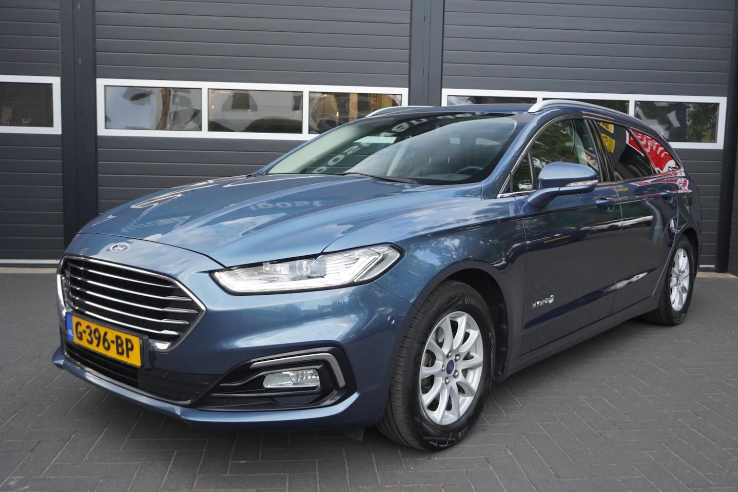 Ford Mondeo Wagon - 2.0 IVCT HEV Titanium Aut/Cruise/Camera/Navi/Carplay/Trekhaak/Climate Control - AutoWereld.nl