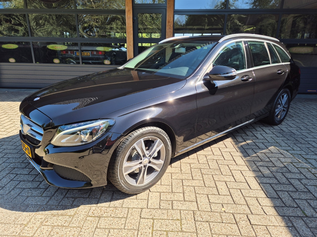 Mercedes-Benz C-klasse Estate - 200 Prestige *LEER *NAVI *XENON *LED *ILS *1E EIG *TREKHAAK * DEALER ONDRHOUDEN - AutoWereld.nl