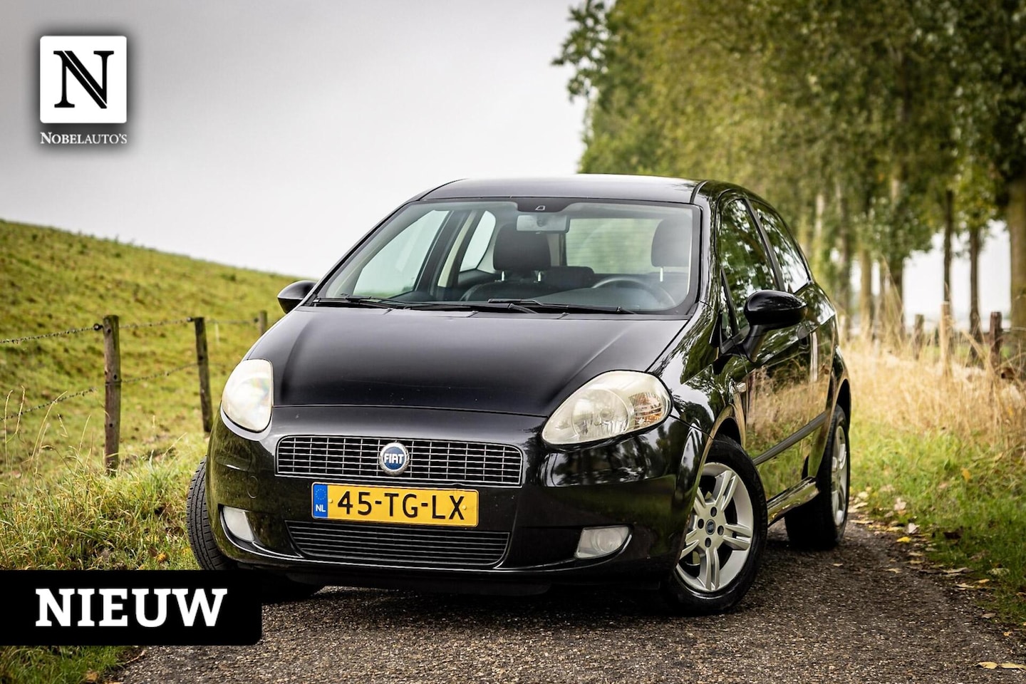 Fiat Grande Punto - 1.4 Edizione Blue & Me | Airco | Nap | LM - AutoWereld.nl