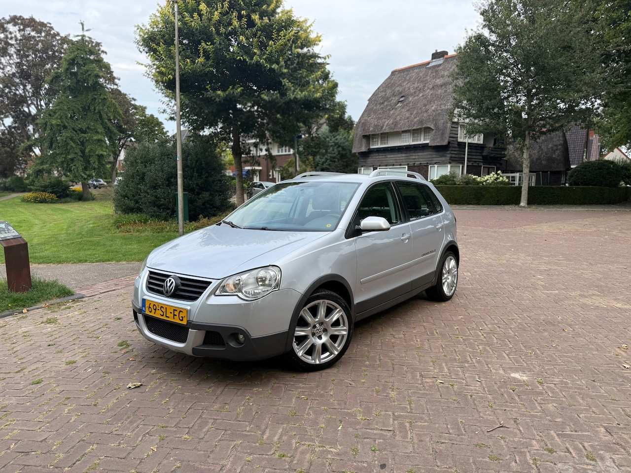 Volkswagen Polo - 1.4-16V Cross Editie | 5 deuren | Airco | Hoge instap | Cruise - AutoWereld.nl