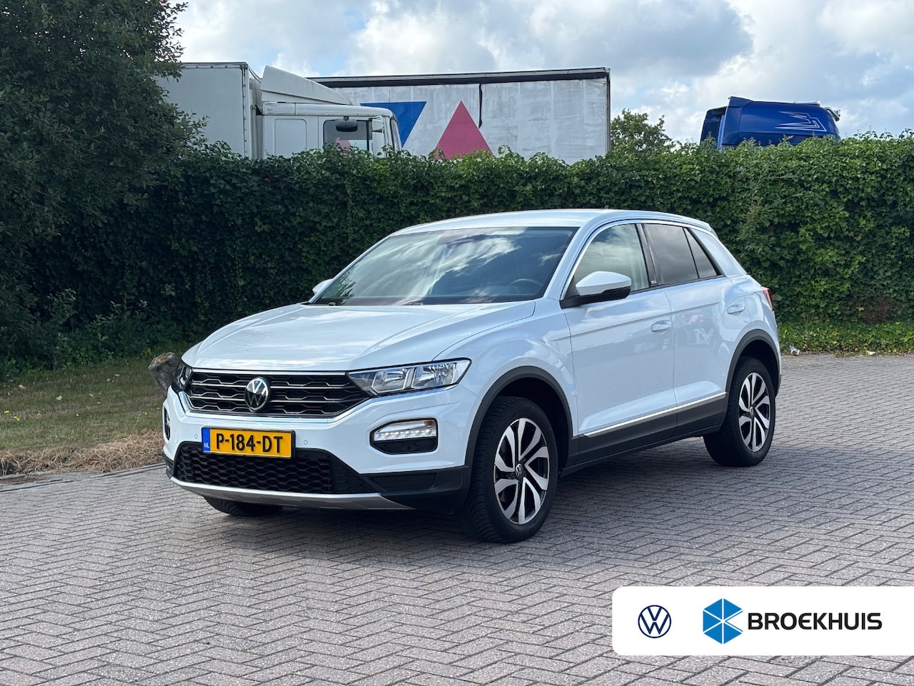 Volkswagen T-Roc - Style Business 1.0 TSI 110 pk | Cruise control Adaptief | Parkeersensoren | Navigatie | Ap - AutoWereld.nl