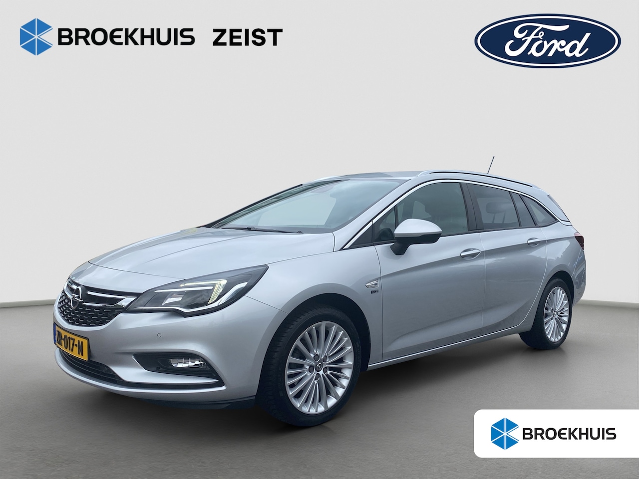 Opel Astra Sports Tourer - 1.4 150pk Turbo 120 Jaar Edition | Trekhaak | AGR-stoel | Privacy-glass | Climate control - AutoWereld.nl