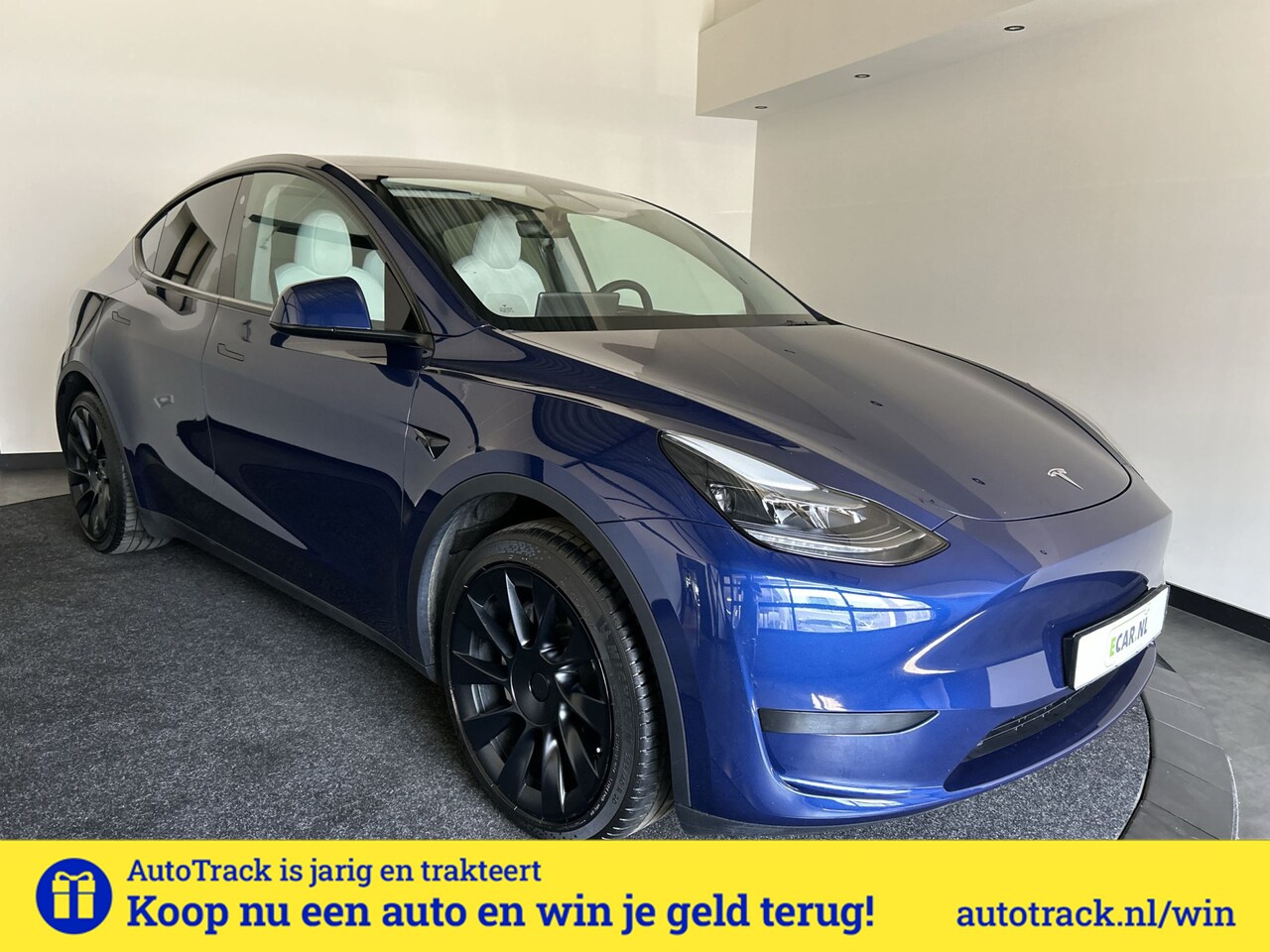 Tesla Model Y - RWD 58 kWh | Prachtig blauw | Wit lederen interieur | | Soh (batterijcheck) 93,1 % - AutoWereld.nl