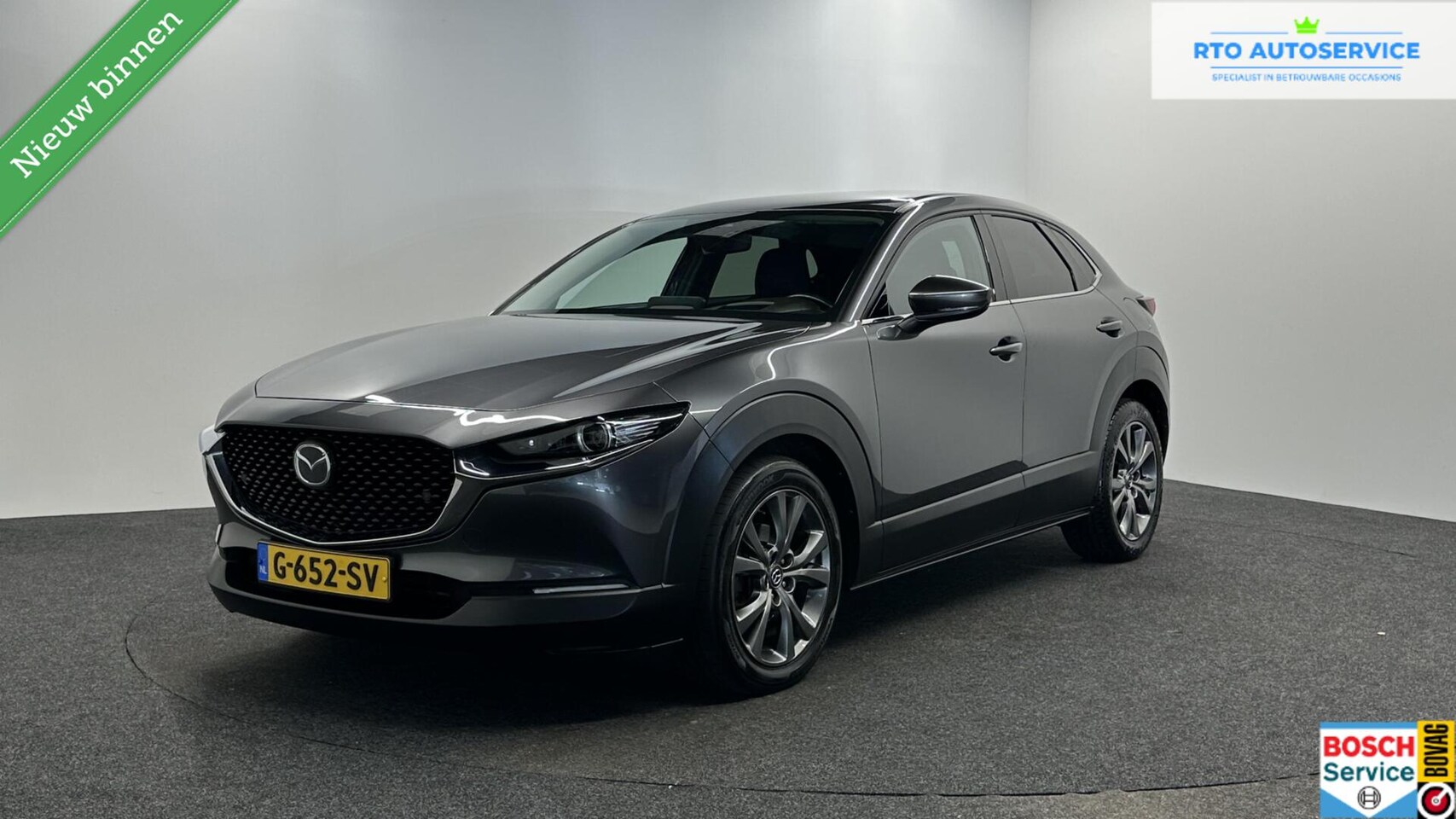 Mazda CX-30 - 2.0 e-SkyActiv-X M Hybrid Luxury LEER TREKHAAK NAVI CAMERA. - AutoWereld.nl