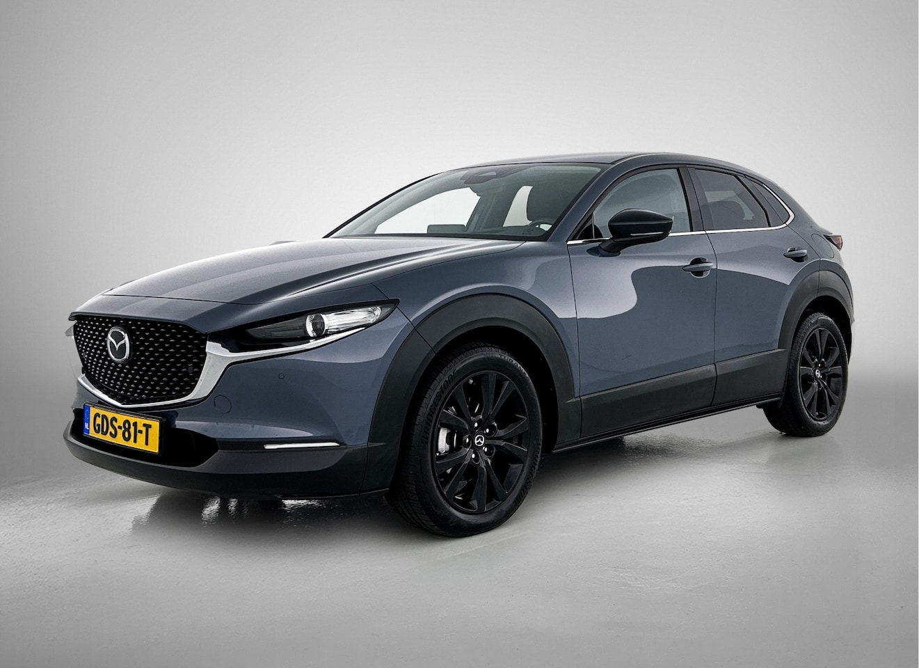 Mazda CX-30 - 2.0 e-SkyActiv-G M Hybrid Homura Navigatie | Camera Achter | Elektr. achterklep - AutoWereld.nl