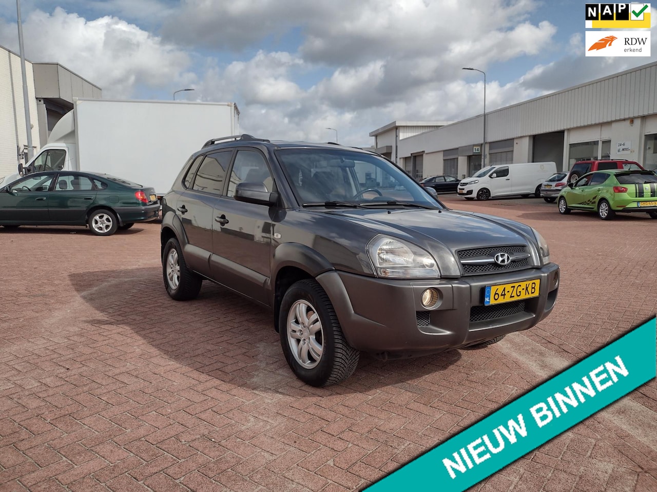 Hyundai Tucson - 2.0i Style MOOIE AUTO BEL 0619590613 APK 10-06-2026 HOGEN IN STAP AIRCO - AutoWereld.nl