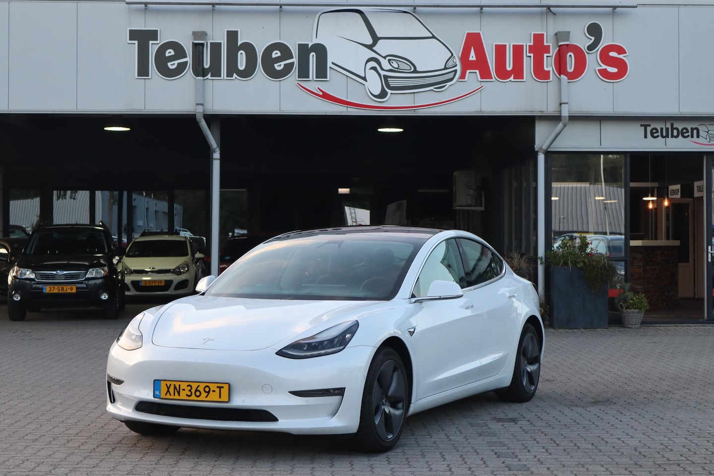 Tesla Model 3 - Long Range RWD Long Range AWD 75 kWh Cruise control, Climate control, 360'Camera - AutoWereld.nl