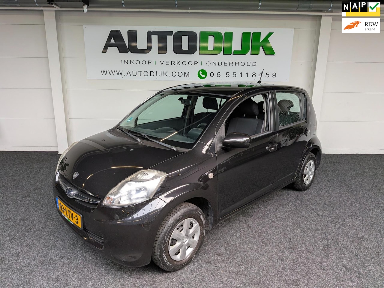 Subaru Justy - 1.0 Black & White - AutoWereld.nl