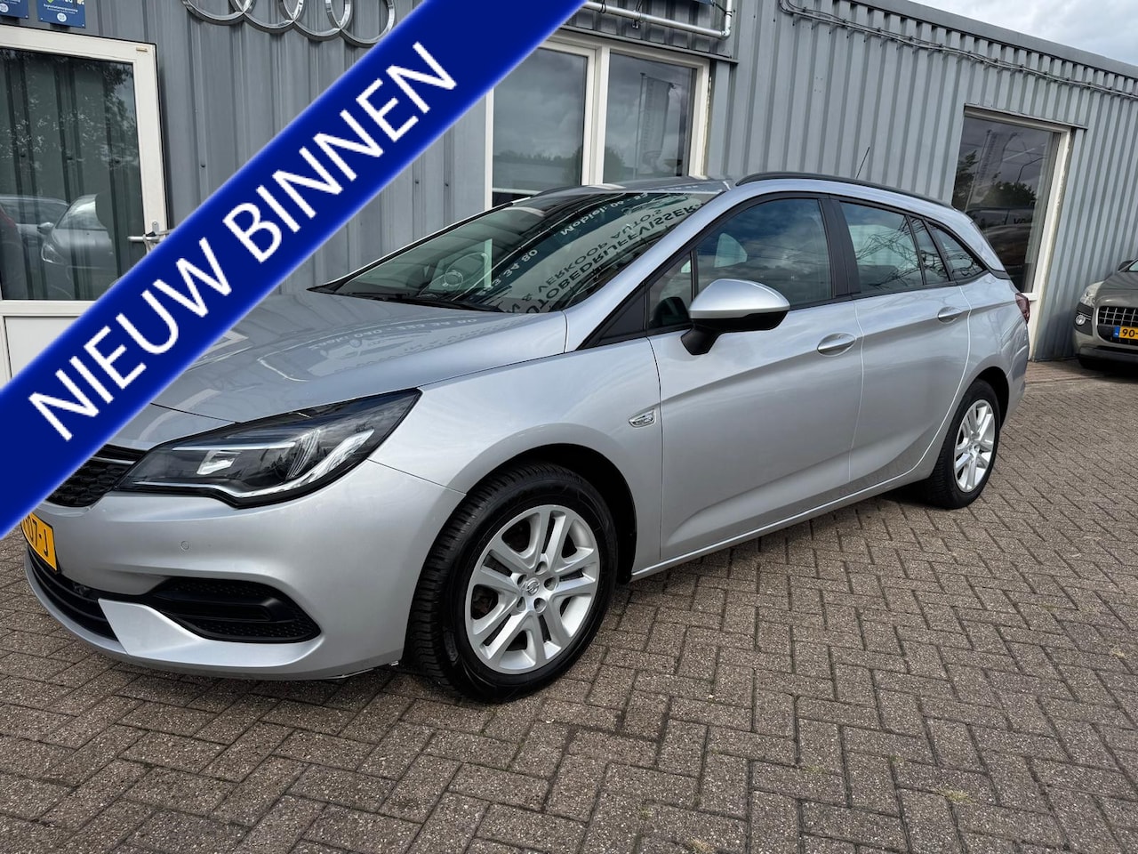 Opel Astra Sports Tourer - navi 1.2 Edition - AutoWereld.nl
