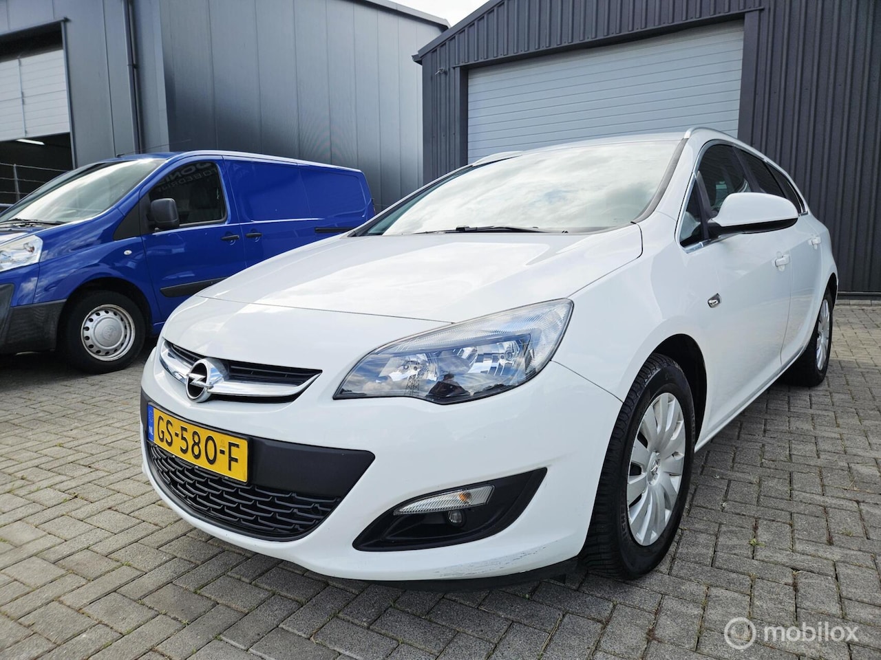 Opel Astra Sports Tourer - 1.4 Turbo LPG G3 Business + APK 09/2026 - AutoWereld.nl