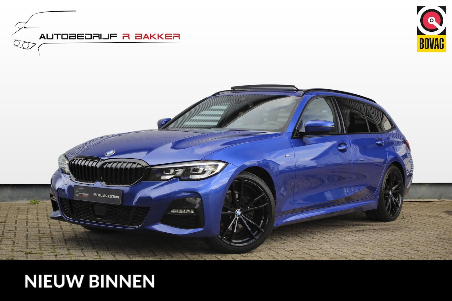 BMW 3-serie Touring - 320i M sport // Portimao Blue | BTW auto | Panoramadak | Trekhaak | Sfeerverlichting | Car - AutoWereld.nl
