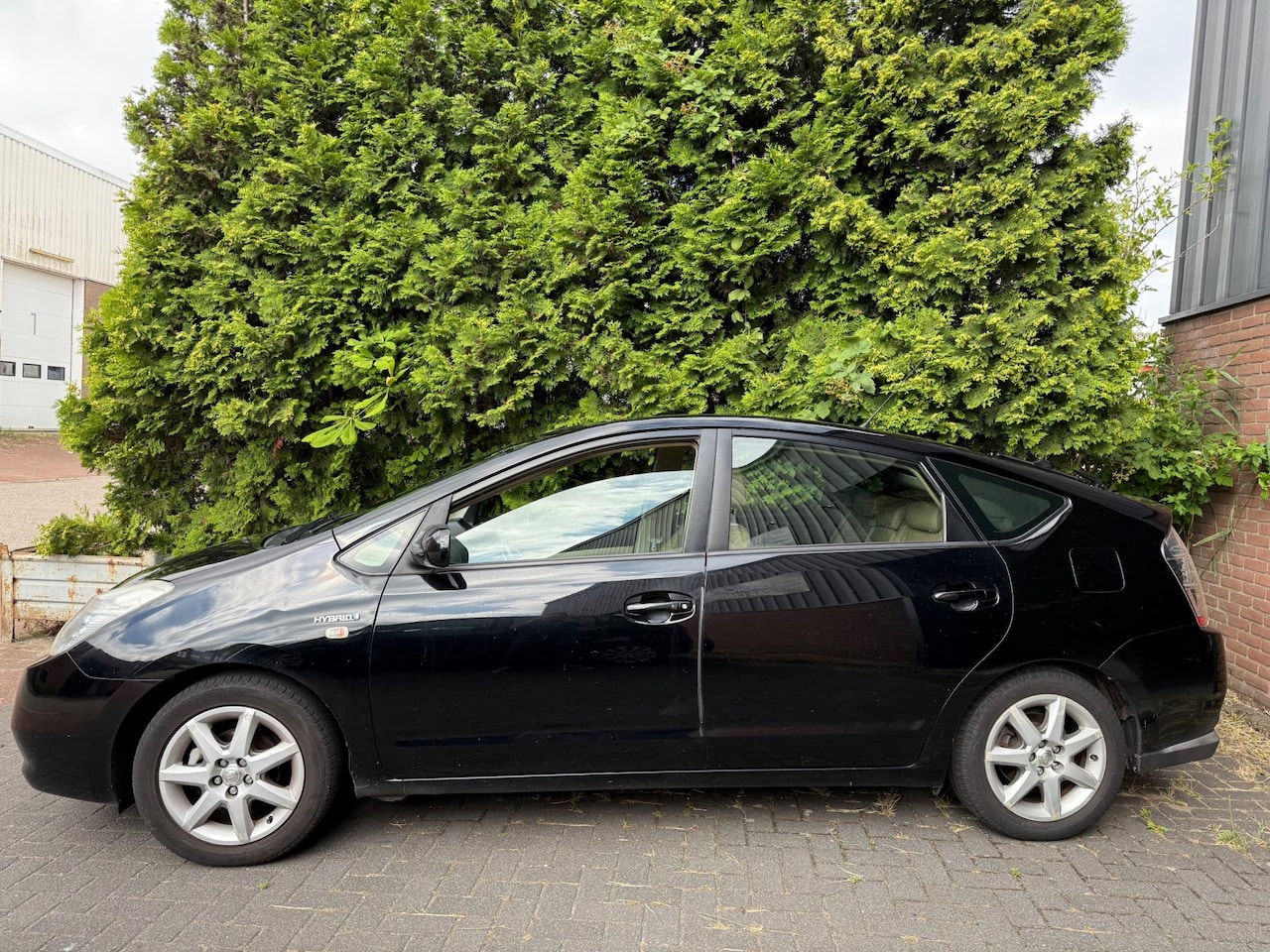 Toyota Prius - 1.5 VVT-i Business Edition 1.5 VVT-i Business Edition,Navi,Leder,Clima,Camera,Cruise control - AutoWereld.nl