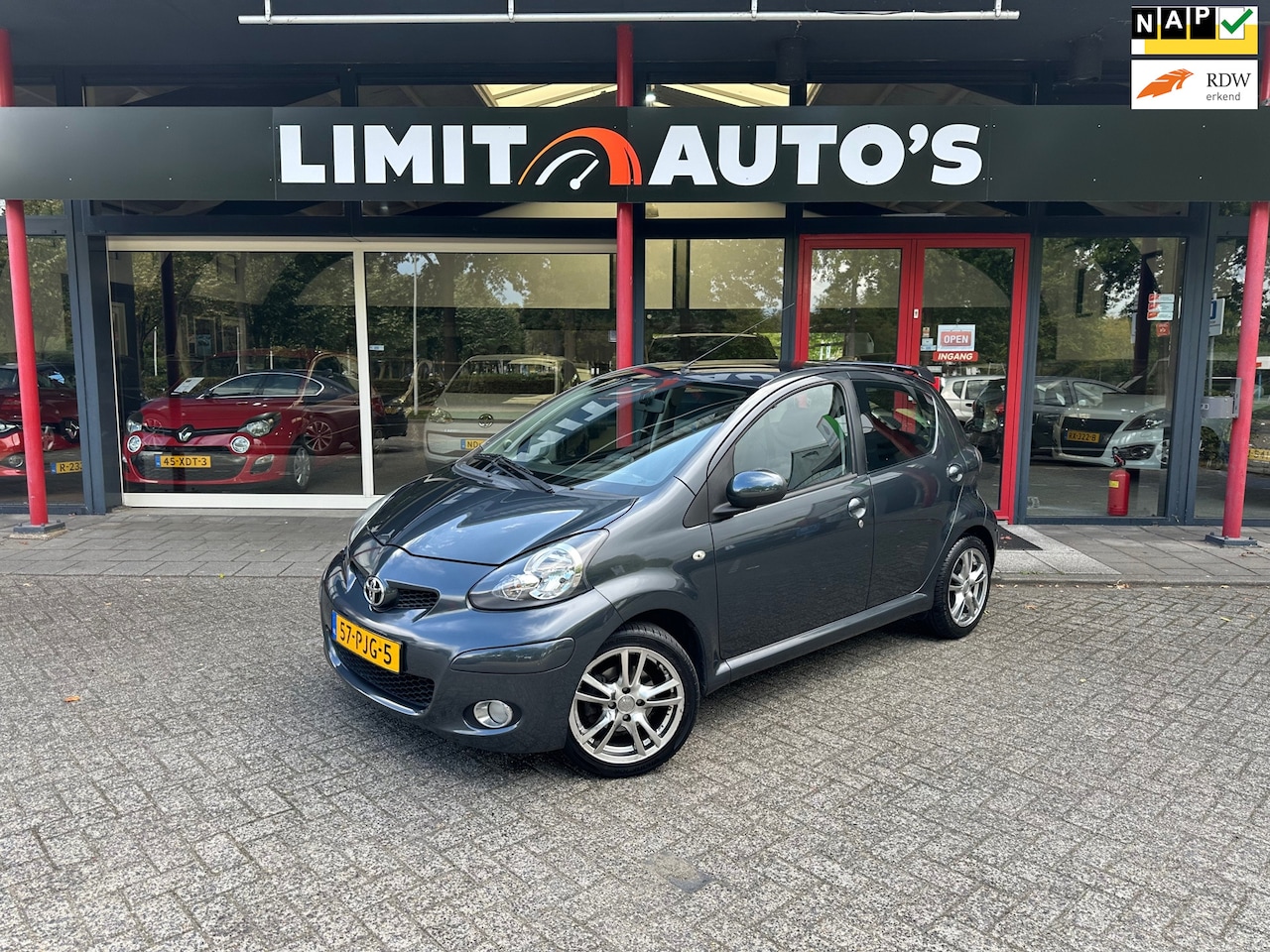 Toyota Aygo - 1.0-12V Comfort Navigator Airco/El.ramen/Leder/Navi/Nap/Apk - AutoWereld.nl