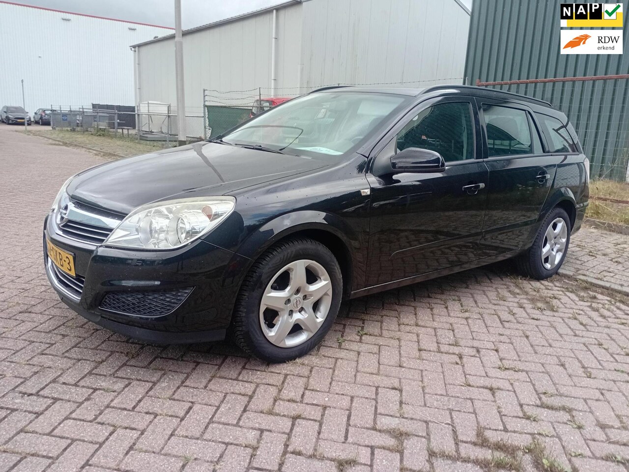 Opel Astra Wagon - 1.4i Business Airco Cruise 204.212 km NAP Trekhaak 2 Afstanbed. Sleutels PDC - AutoWereld.nl