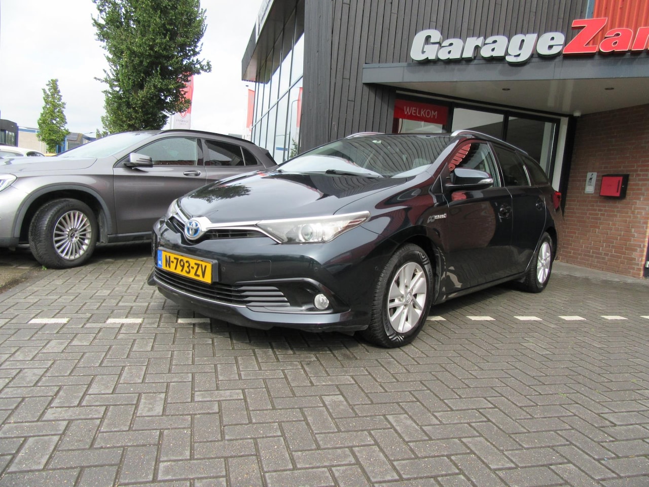 Toyota Auris Touring Sports - 1.8 Hybrid Now 1.8 Hybrid Now - AutoWereld.nl