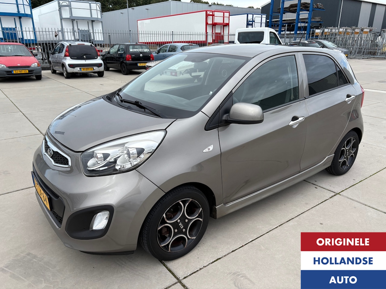 Kia Picanto - 1.2 CVVT World Cup Airco Sporting 86PK Motor - AutoWereld.nl